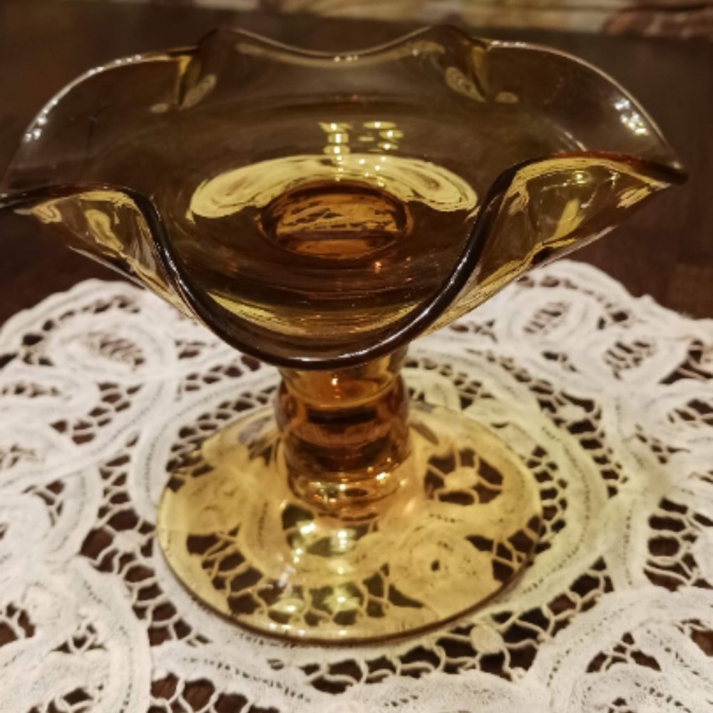 Vintage golden glass footed candy dish or dessert stand